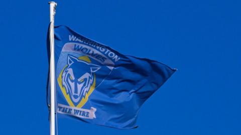 Warrington Wolves flag at their Halliwell Jones Stadium home
