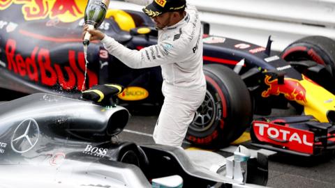 lewis hamilton celebrates