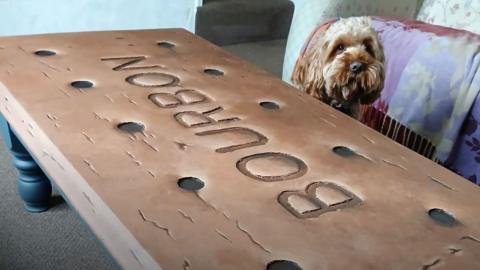 Large coffee table painted to look like a Bourbon biscuit.