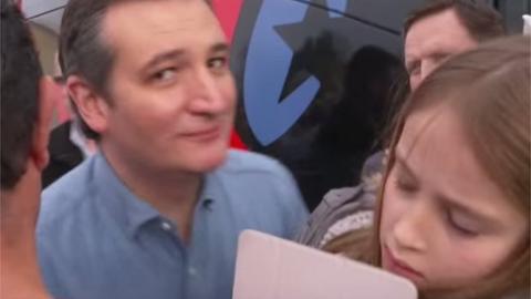 Ted Cruz's daughter flinches as he kisses her while campaigning in Iowa, February 2016