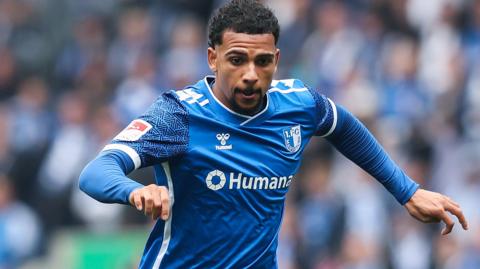 Xavier Amaechi in action for Magdeburg