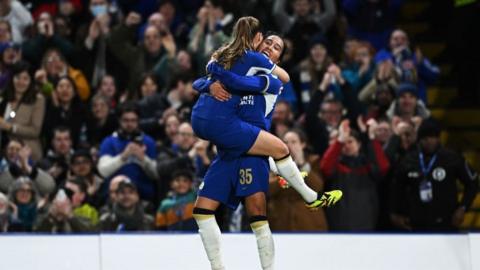Chelsea players celebrating after reaching the semi-finals of the women's Champions League