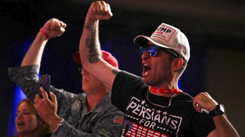 Image shows a man in a Persians for Trump shirt at CPAC