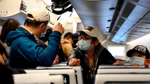 Passengers on a plane in Shanghai