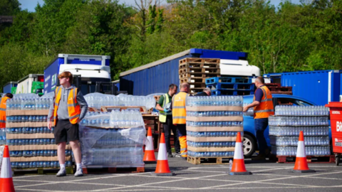 Bottled water being handed out