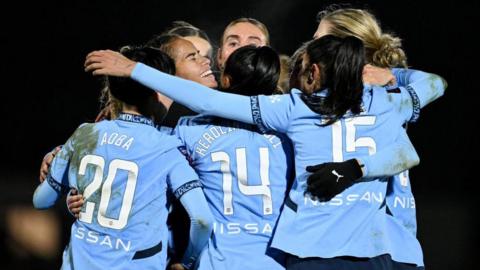 Manchester City players celebrate