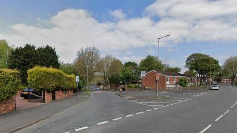 A street view image showing the junction of Old Park Road and Manor House Road in Wednesbury.