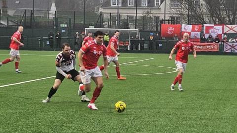 Action from Jersey Bulls v Faversham Town