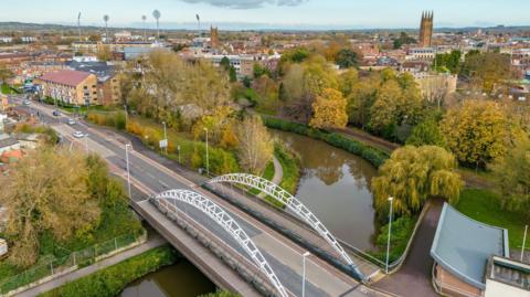 An aerial view of Taunton showing the River Tone and, in the distance, the cricket stadium