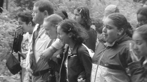 A black and white image of Kevin Stockley and his pupils crying 