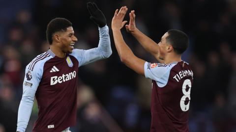 Marcus Rashford and Youri Tielemans celebrate