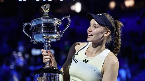 Elena Rybakina with Australian Open trophy