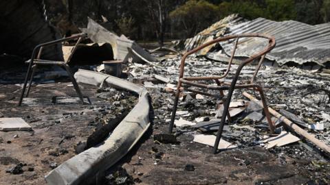 Burnt chairs in a burnt out property in Ruffy, Victoria, Australia, on 11 January