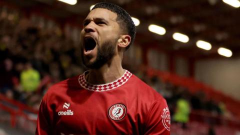 Nahki Wells shouts in celebration after scoring a goal for Bristol City