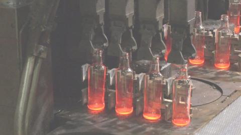 Robots marking bottles