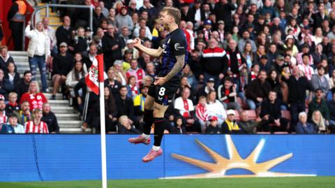 Riley McGree jumps for joy after opening the scoring at Southampton