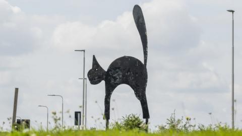 Black cat sculpture on the Black Cat roundabout by Roxton, Bedfordshire