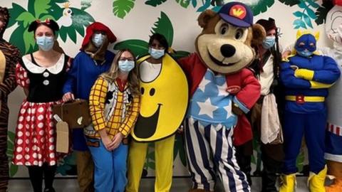Toy character mascots attend the opening of the children's casualty department at James Paget Hospital