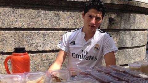 Ibrahim works at his stall