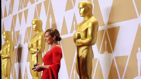 Allison Janney holds an Oscar award