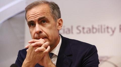 Mark Carney looking poensive