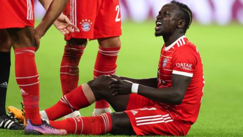 Sadio Mane reacts after suffering an injury while playing for Bayern Munich