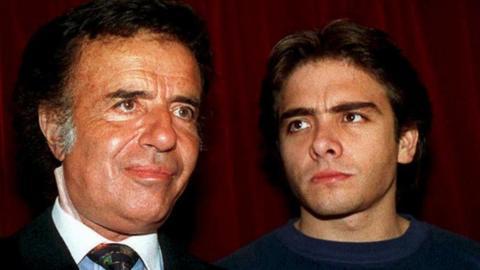 This 1993 file photo shows Argentine President Carlos Menem (L) with his son Carlos Facundo