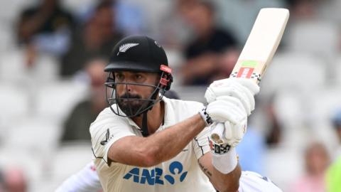 New Zealand batter Daryl Mitchell plays a shot