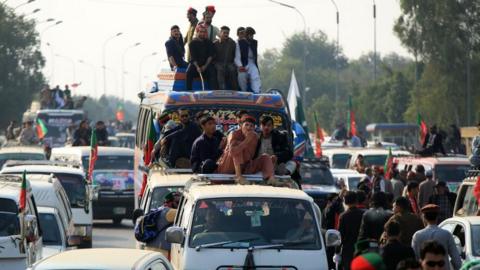 Supporters of the former Prime Minister and chairman of opposition party Pakistan Tehreek-e-Insaf (PTI), Imran Khan, take part in a rally towards Islamabad to demand release of Imran Khan's, in Peshawar, Pakistan, 24 November 2024.