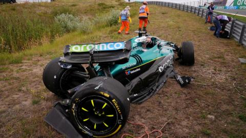 The damaged Aston Martin of Lance Stroll after he crashed at Turn Three during Dutch Grand Prix second practice