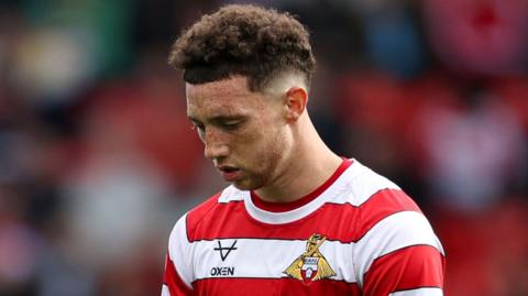 Doncaster had Jordan Gibson sent off in the second half