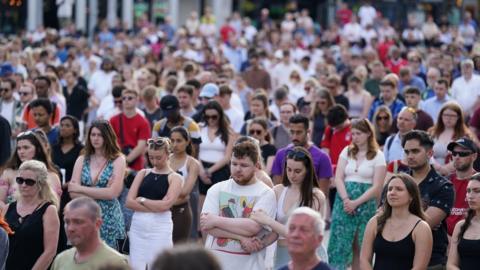 The crowds during a minute's silence