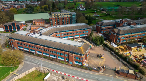 A bird's eye view of St Martin's Place in Slough, an office complex of four buildings.