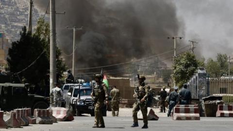 Smoke billows after armed militants attacked the area close to the presidential place and other government offices, during Eid al-Adha celebrations in Kabul, Afghanistan, 21 August 2018.