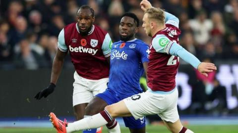 Orel Mangala is closed down by Jarrod Bowen in Everton's game against West Ham at London Stadium