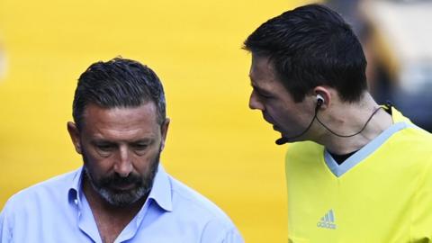 Kilmarnock manager Derek McInnes with referee Kevin Clancy