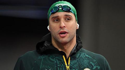 South Africa's Chad le Clos arrives for the Men's 50m Butterfly Semi-Final at the swimming event at the Tollcross International Swimming Centre in Glasgow, on day five of the Commonwealth Games 