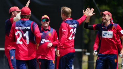 Jersey celebrate Dom Blampied's wicket