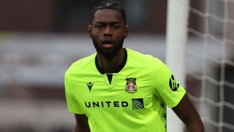 Arthur Okonkwo gets ready to defend the Wrexham goal