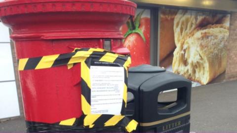 Taped-up post box