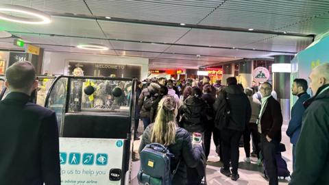 People leaving Gatwick Airport