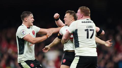 Wales celebrate victory