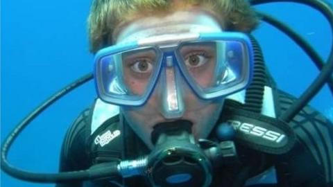 Rich Osborn under water and scuba diving