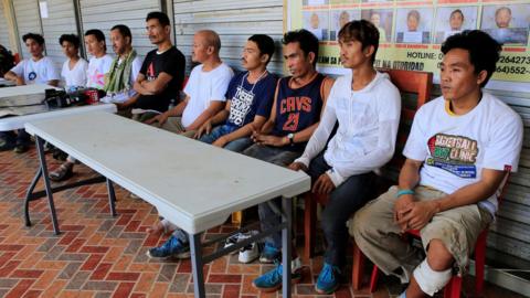 Rescued policemen and civilians who were trapped during fighting between government troops against insurgents from the Maute group, who has taken over large parts of the Marawi city, answer questions during a conference in Marawi city, Philippines 13 June 2017