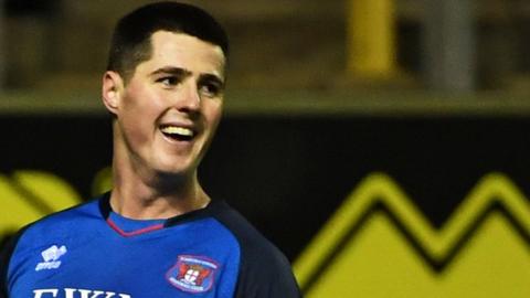 Jon Mellish has signed a new two-year deal with Carlisle United