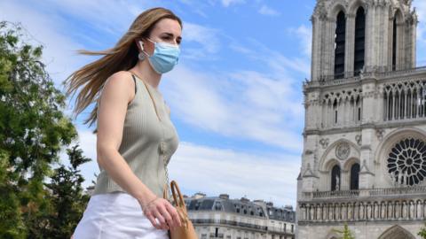 A woman walks in France