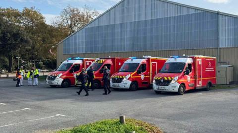 Firefighting lorries outside a building