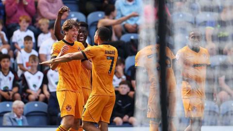Fer Lopez celebrates with teammate Andre after giving Wolves the lead with his first league goal for the club.