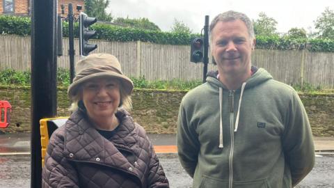 Former county councillor Fiona Davidson and campaigner Sam Neatrour at the 'switch on' of the traffic lights on Epsom Road Guildford