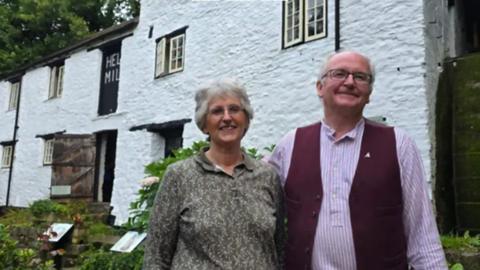 Kathy and David Jones outside their 500-year-old mill
